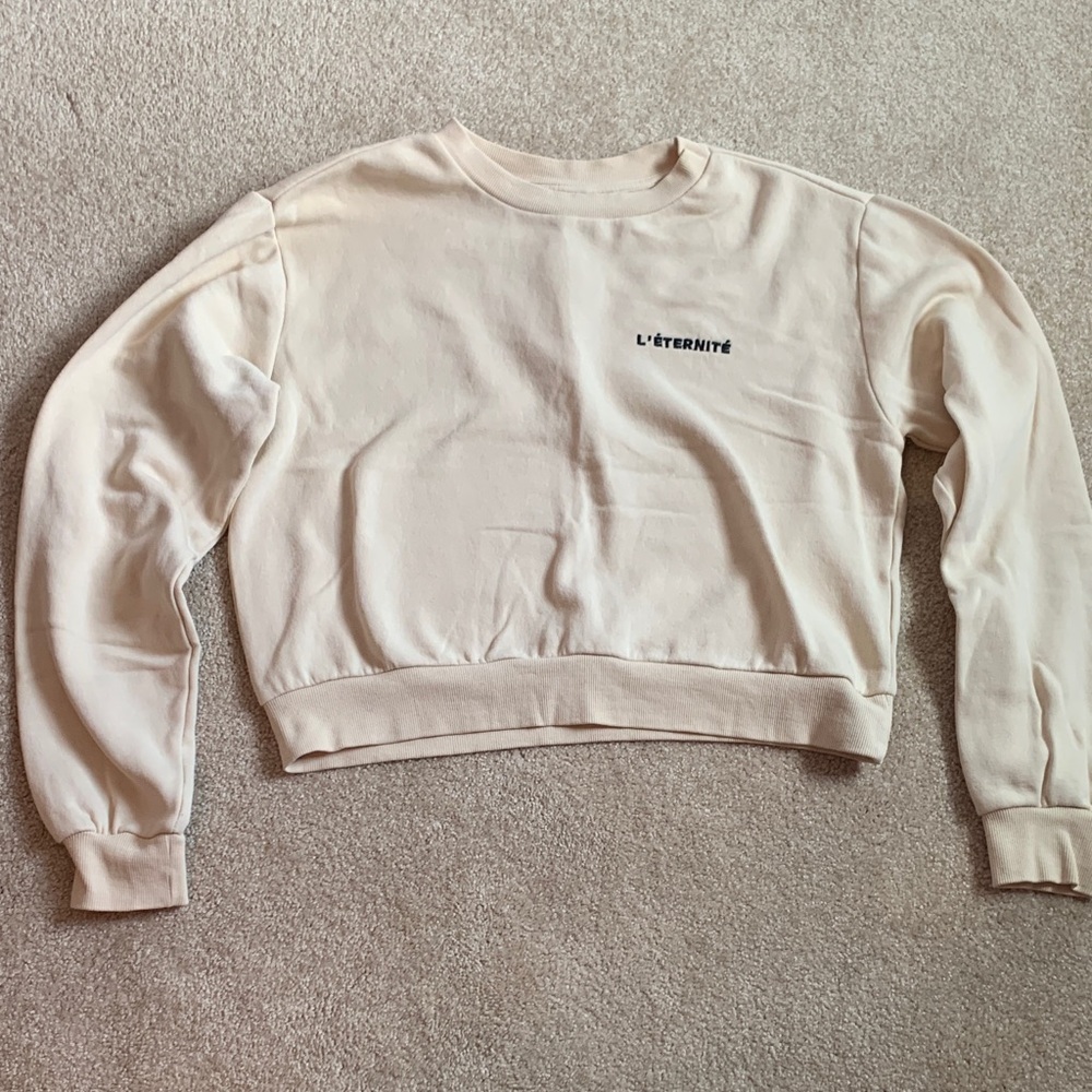 Divided Off-White Sweatshirt with Black Lettering